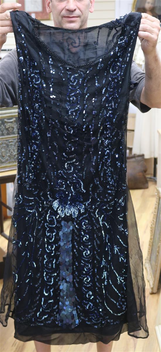 A 1920s petrol blue sequin on black net flapper dress (with later alterations)